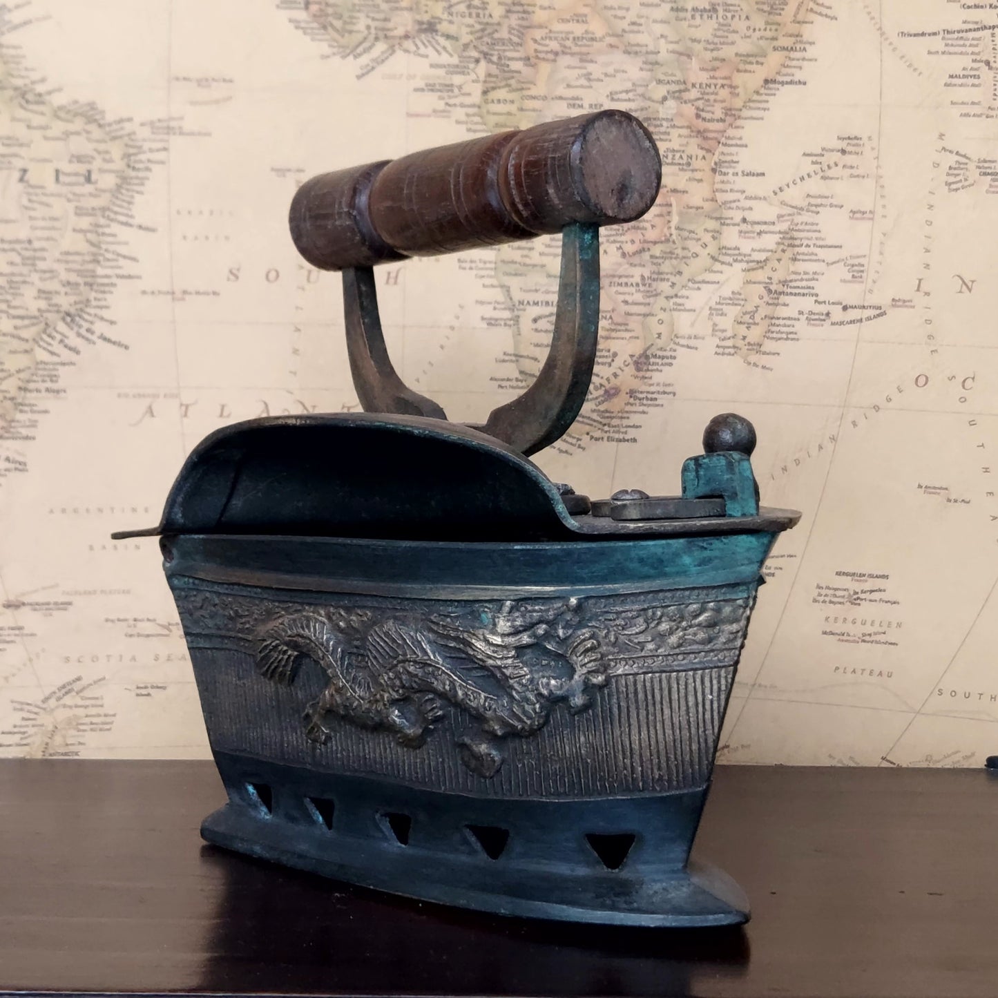 Vintage Peranakan Charcoal Clothes Iron with Oriental Dragon Carving & Wooden Handle Collectible Item Rustic Home Decor Statement Piece