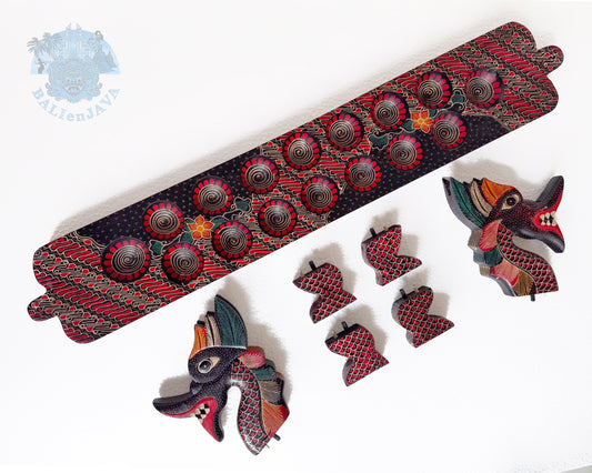 Detached parts including a board game with two dragon heads and four legs on a white background.