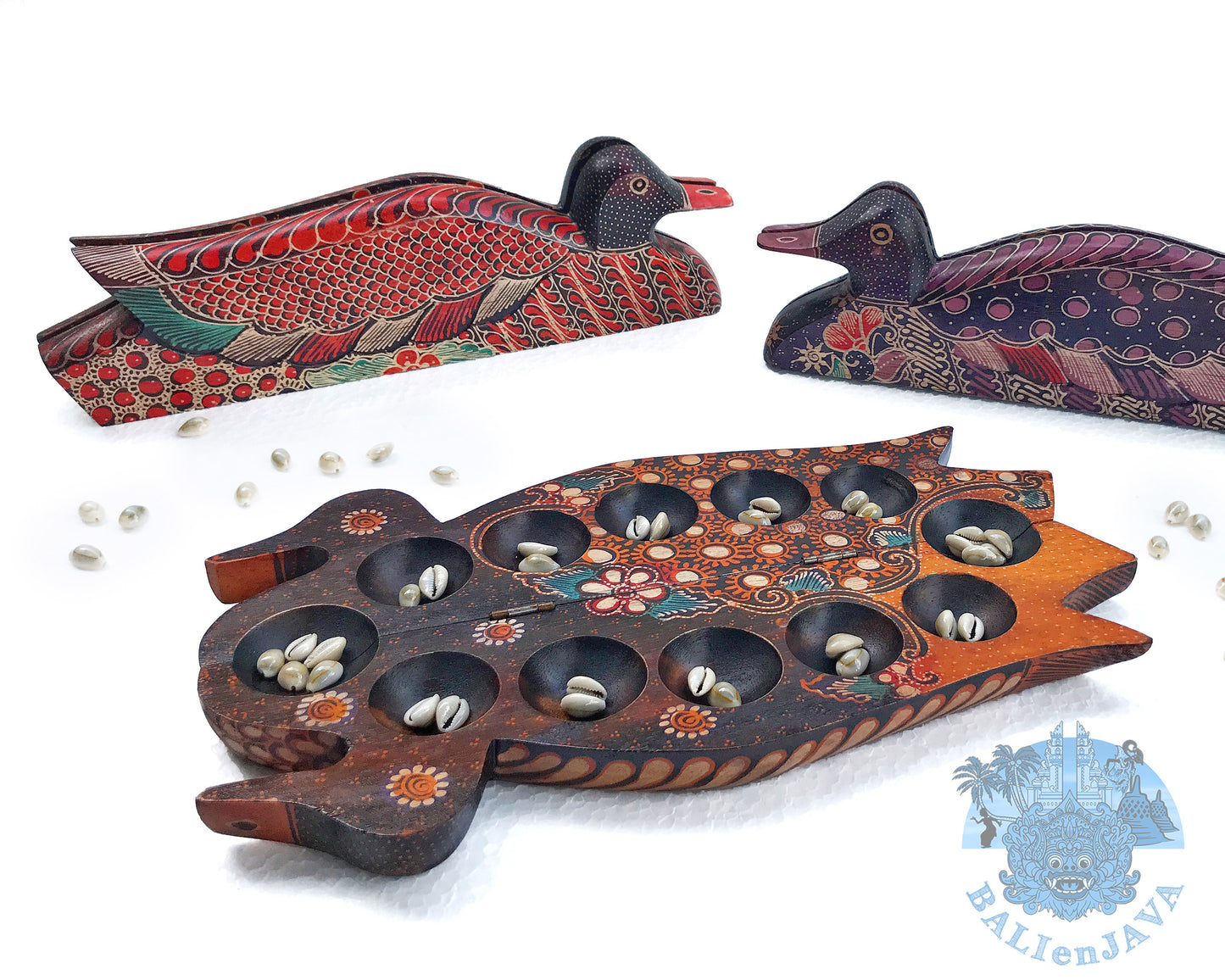 Foldable wooden mancala boards in the shape of ducks with intricate patterns, shown in folded and opened position.