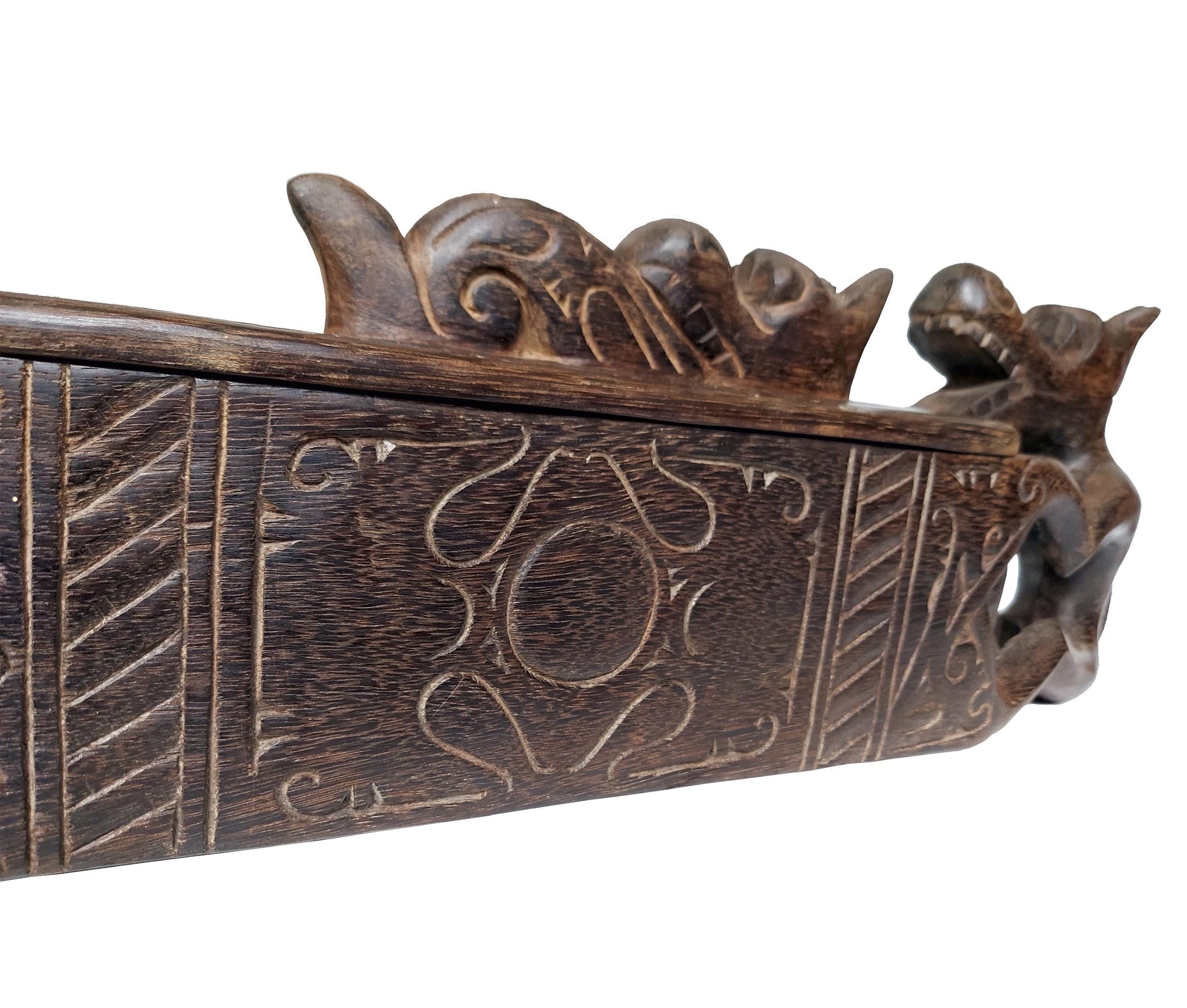 Traditional Borneo tribe wooden box with dragon carving and sliding lid. 