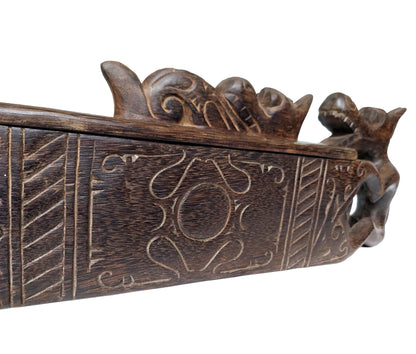 Traditional Borneo tribe wooden box with dragon carving and sliding lid. 