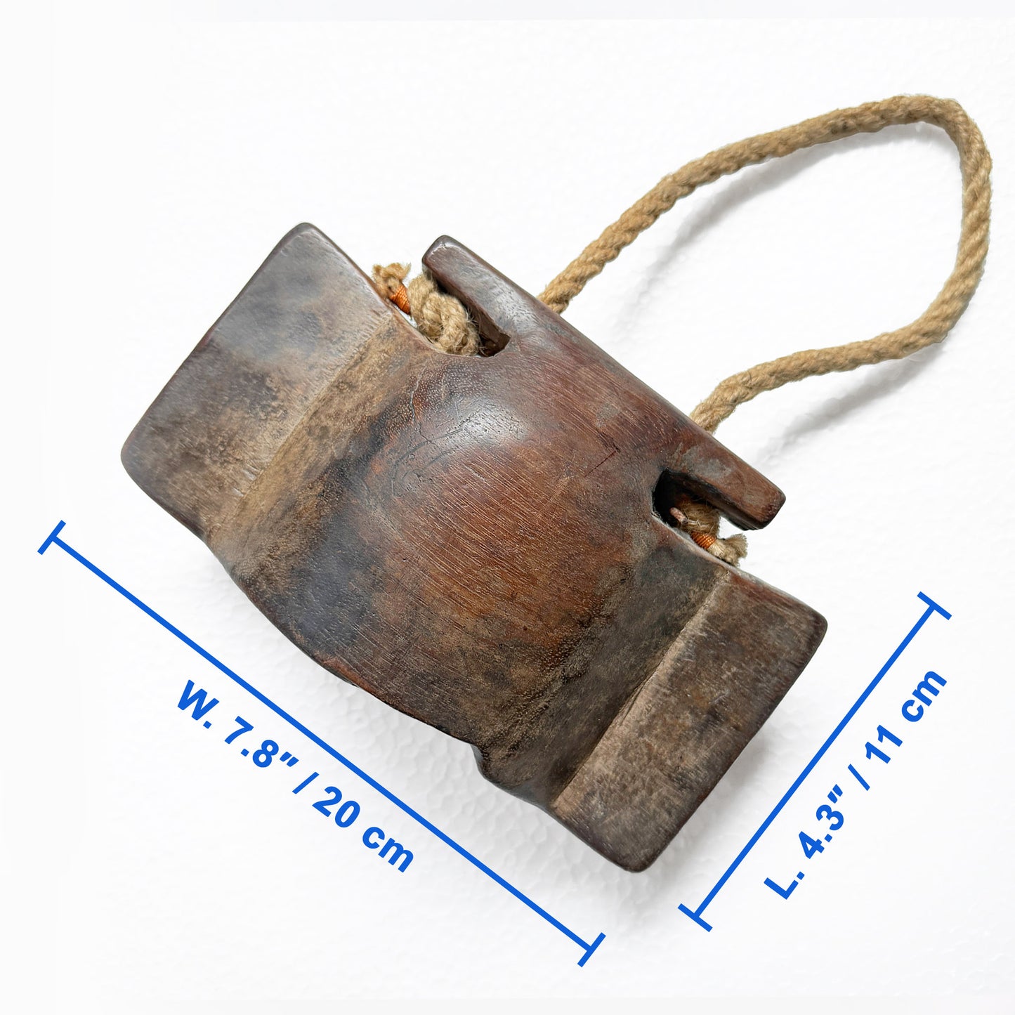 Wooden cattle bell with a rope handle, shown with measurements information on a white background
