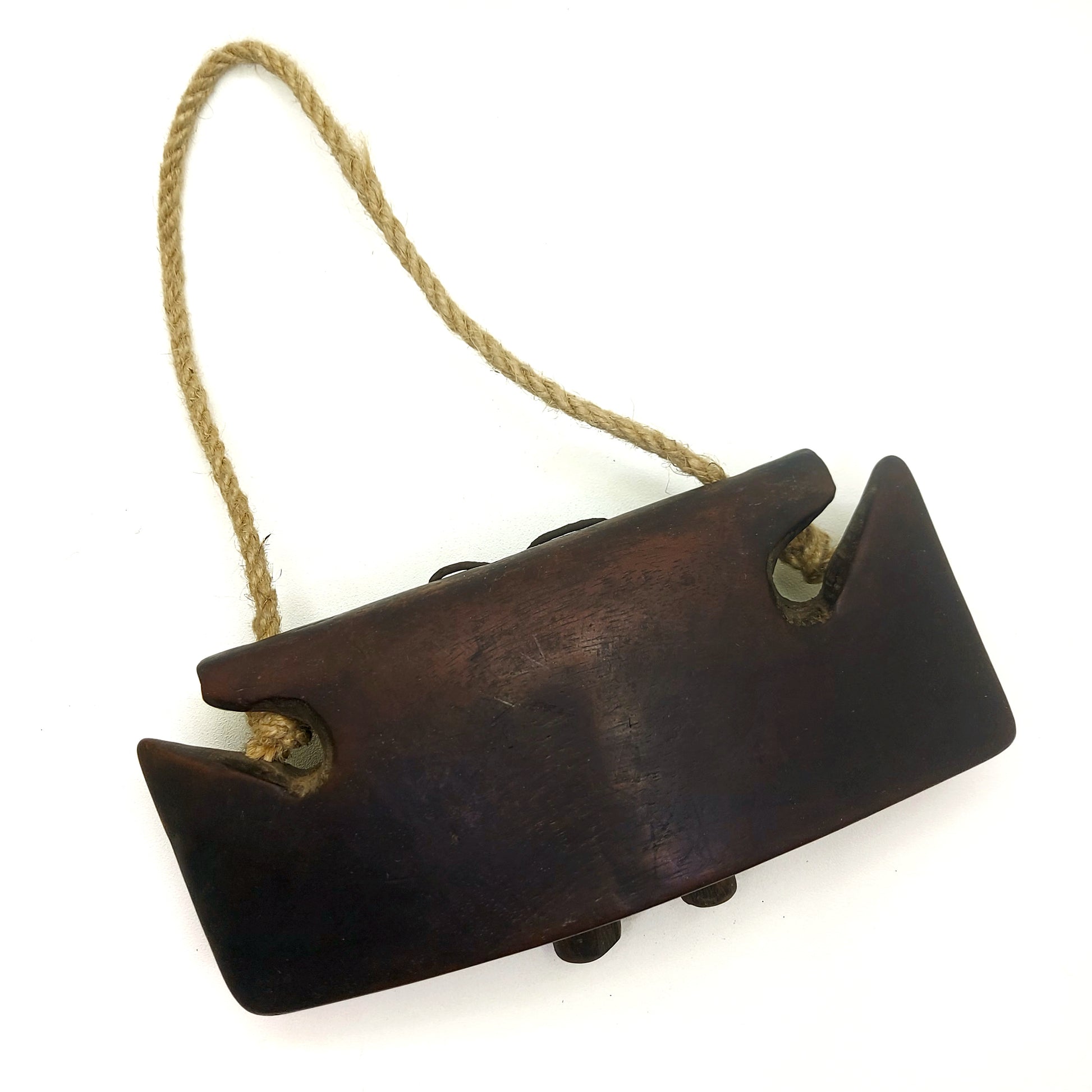 Vintage wooden bell on a white background