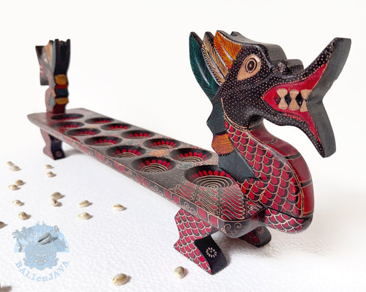 Decorative dragon-shaped board game with hand-painted pattern on a white background