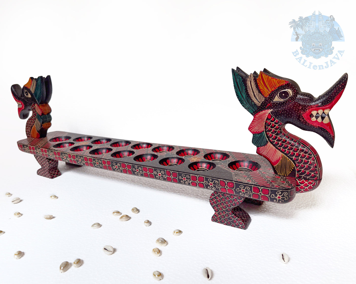 Decorative wooden board game with dragon designs on a white background