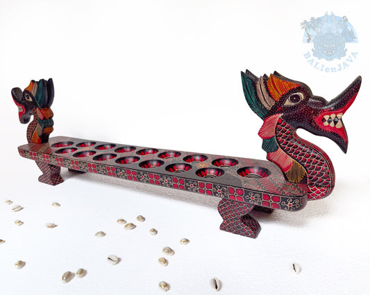 Decorative wooden board game with dragon designs on a white background