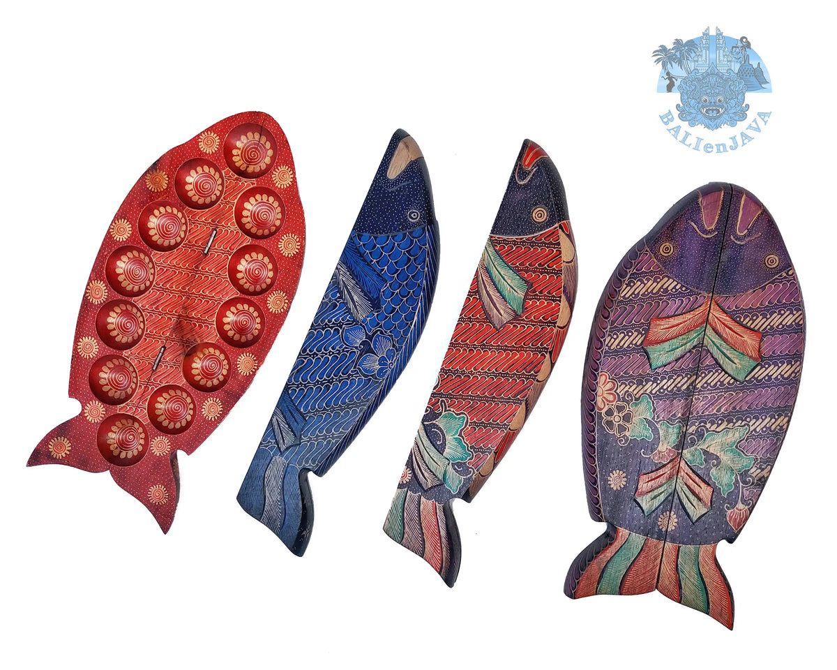 Four fish-shaped mancala board games arranged on a white background.