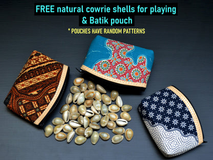 Small batik fabric pouch with seeds on a black background