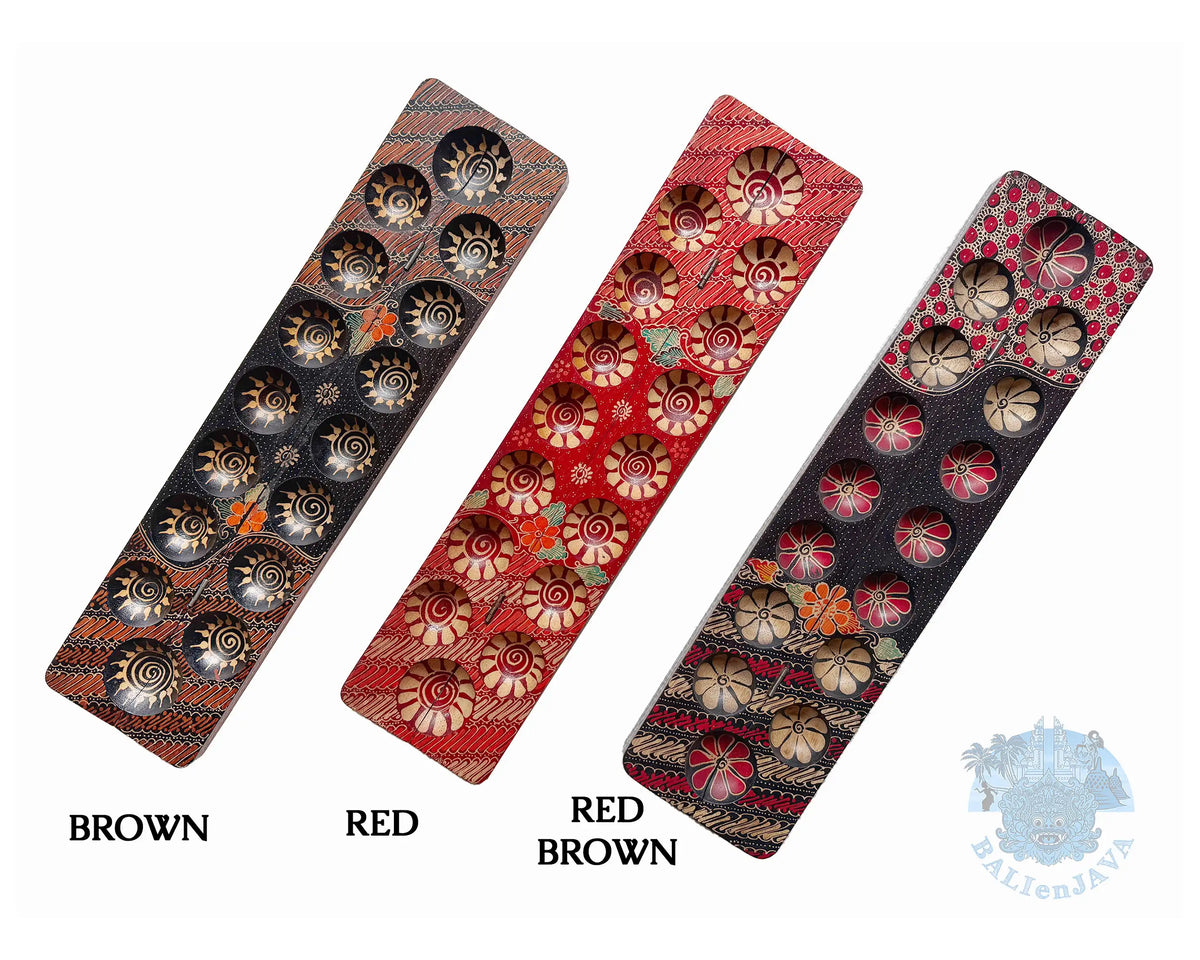 Three mancala board games with hand-painted design and seven circular pits labeled Brown, Red, and Red Brown on a white background